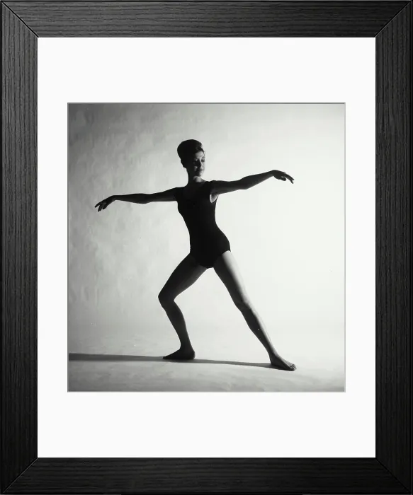 Framed Print : Vintage Photograph. Woman stretching in exercise pose Framed Print : Vintage Photograph. Woman stretching in exercise pose