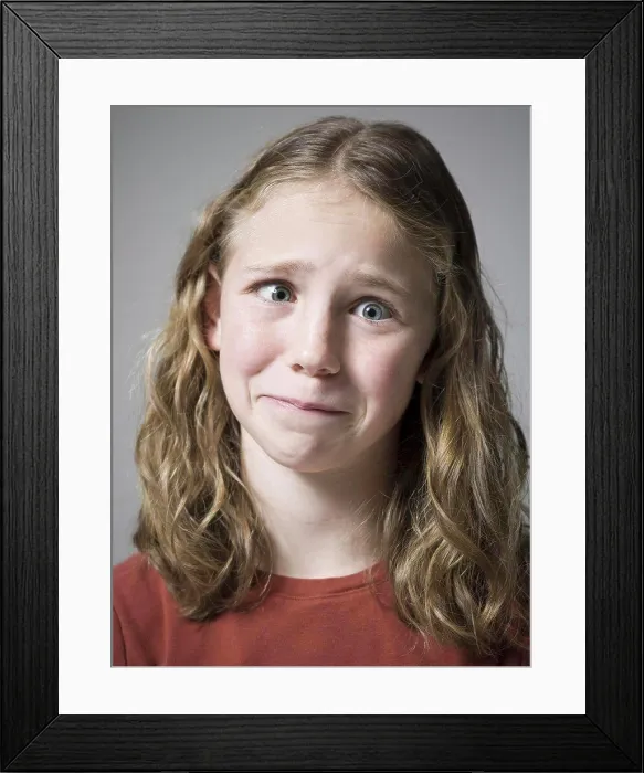 Framed Print : Close-up of a teenage girl crying Framed Print : Close-up of a teenage girl crying