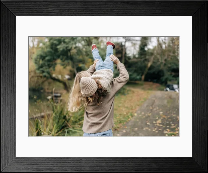 Framed Print : Happy young mother and little daughter fooling around outside in autumn Framed Print : Happy young mother and little daughter fooling around outside in autumn