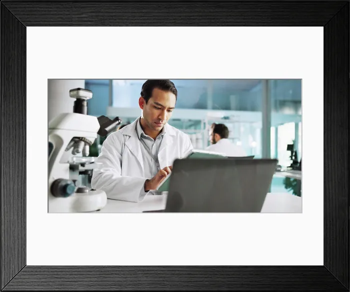 Framed Print : Tablet, medical and research with man in laboratory for typing Framed Print : Tablet, medical and research with man in laboratory for typing