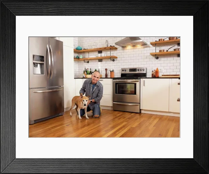 Framed Print : Low angle portrait of man and his pet together in kitchen