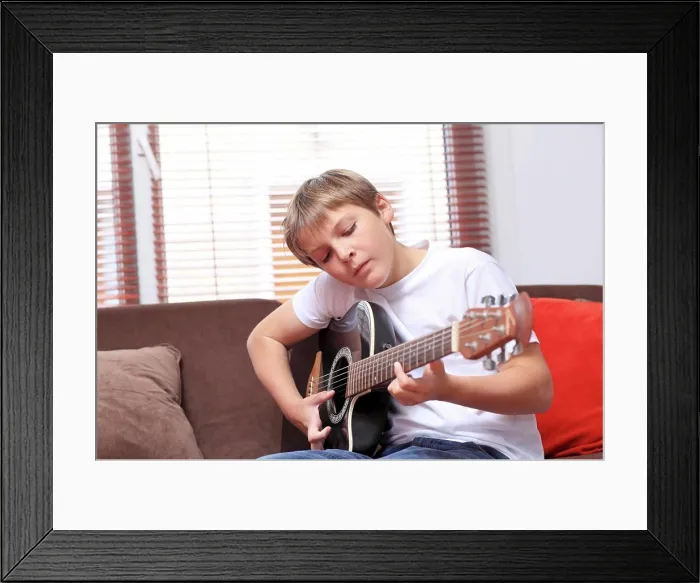 Framed Print : France Young Boy Playing Guitar Framed Print : France Young Boy Playing Guitar