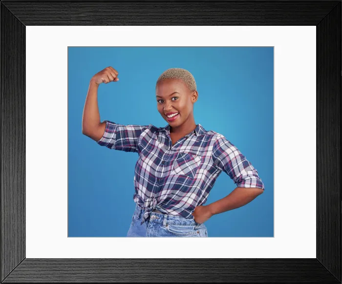 Framed Print : Muscle, arm flex and portrait of black woman in studio for empowerment Framed Print : Muscle, arm flex and portrait of black woman in studio for empowerment