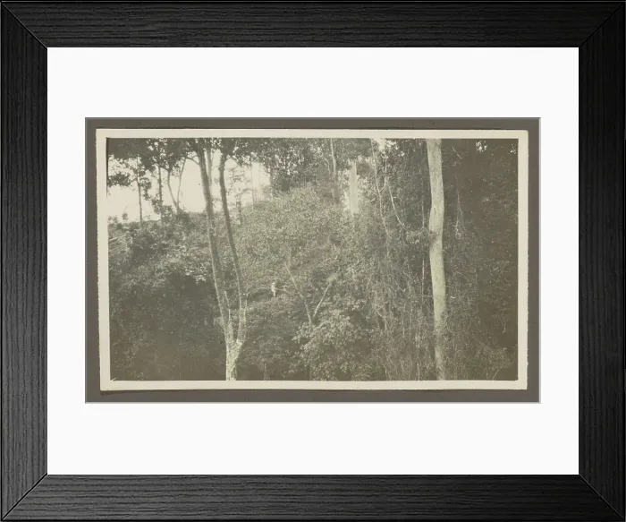Framed Print : Man in tropical clothing on a mountain slope Framed Print : Man in tropical clothing on a mountain slope