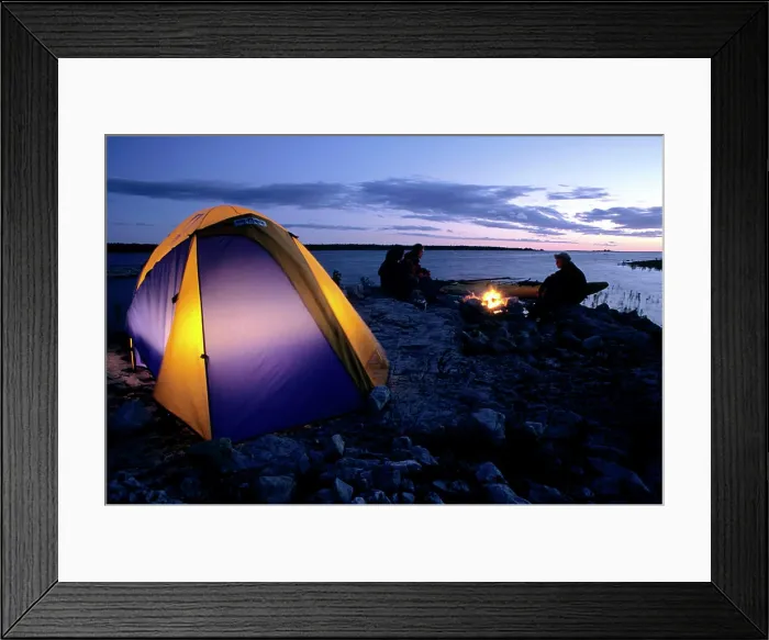 Framed Print : Campers enjoy a fire on the shore of Lake Huron at sunset, near the town of Tobermory, Bruce Peninsula, Ontario, Canada