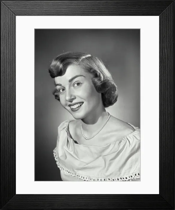 Framed Print : Vintage photograph. Portrait of woman smiling with head tilted