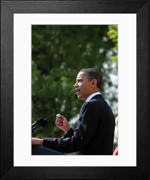 Framed Print : President Barack Obama with a serious expression as he participates in a naturalization ceremony for active duty Framed Print : President Barack Obama with a serious expression as he participates in a naturalization ceremony for active duty