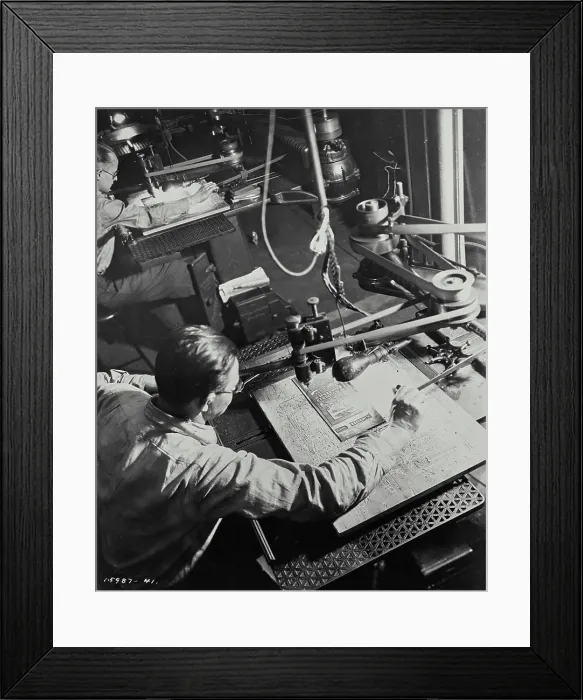 Framed Print : Vintage photograph. Photo shows one of the mechanical phases of newspaper making. Here are the men are routing a plate Framed Print : Vintage photograph. Photo shows one of the mechanical phases of newspaper making. Here are the men are routing a plate