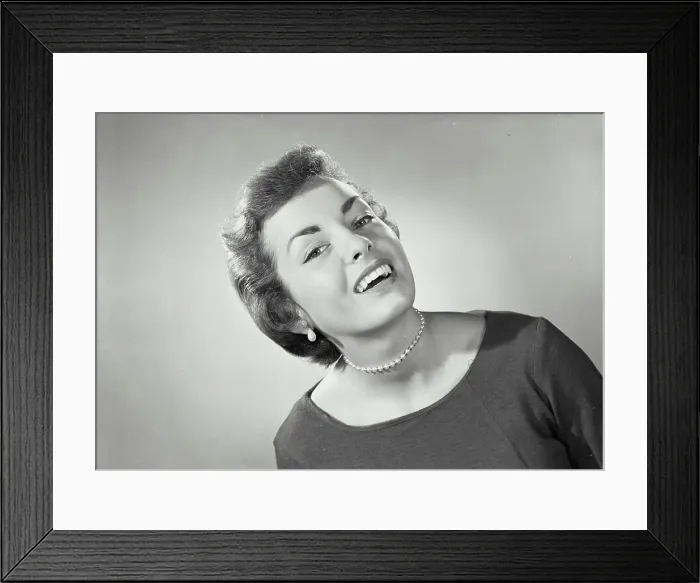 Framed Print : Vintage photograph. Woman with short hair wearing pearl necklace and blouse Framed Print : Vintage photograph. Woman with short hair wearing pearl necklace and blouse