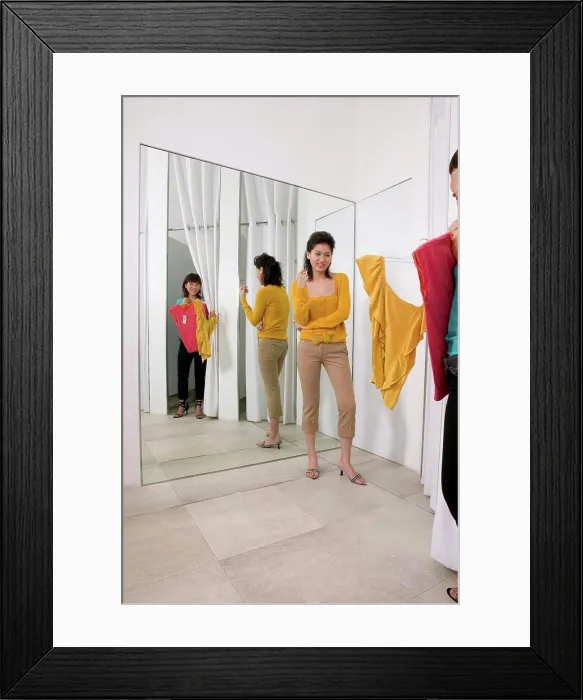 Framed Print : Two women in clothes store