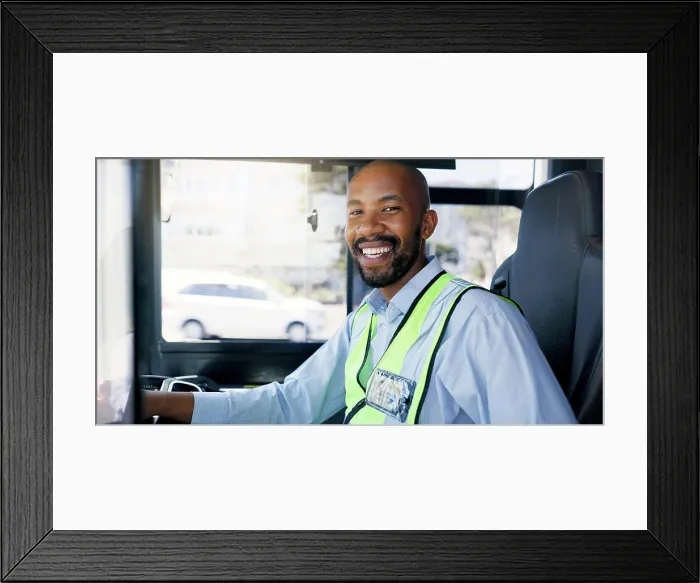 Framed Print : Bus driver, portrait and smile of black man at station for commute Framed Print : Bus driver, portrait and smile of black man at station for commute