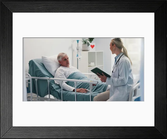 Framed Print : Doctor with tablet, consulting and old man in hospital bed for healthcare