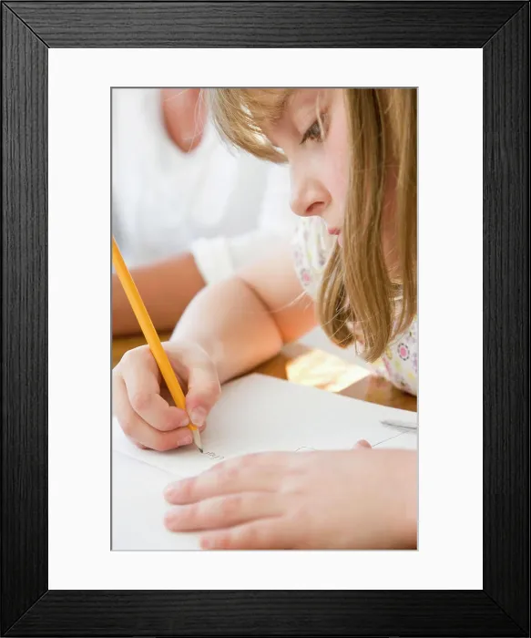 Framed Print : Young Girl Writing Framed Print : Young Girl Writing