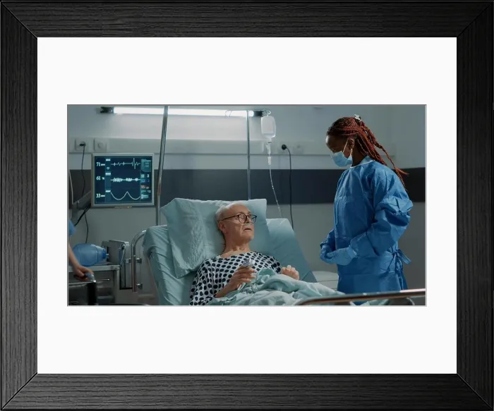 Framed Print : Hospital ward medical surgeon talking to sick patient