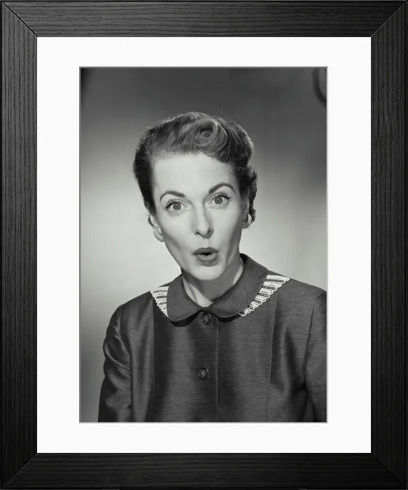 Framed Print : Vintage Photograph. Woman wearing buttoned up blouse with surprised expression