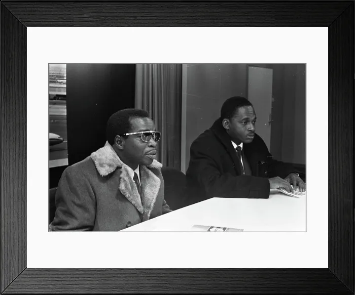 Framed Print : Anefo photo collection. Two Surinamese teachers at Schiphol during press conference left F Framed Print : Anefo photo collection. Two Surinamese teachers at Schiphol during press conference left F