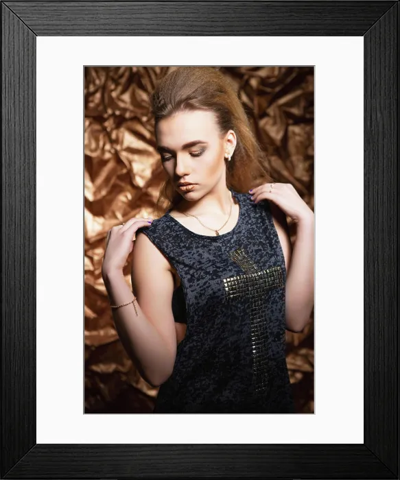 Framed Print : Pretty young blonde posing in the studio Framed Print : Pretty young blonde posing in the studio