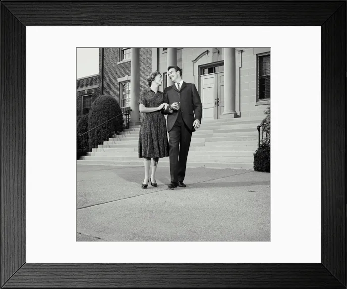 Framed Print : Vintage Photograph. Husband and wife walking down steps with arms locked. Frame 5 Framed Print : Vintage Photograph. Husband and wife walking down steps with arms locked. Frame 5