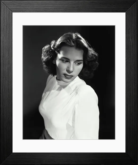 Framed Print : Vintage Photograph. Brunette woman wearing white blouse with dramatic lighting, turned to side Framed Print : Vintage Photograph. Brunette woman wearing white blouse with dramatic lighting, turned to side