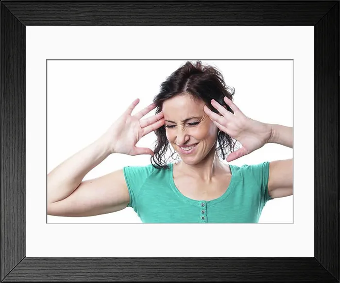 Framed Print : mature woman suffering from migraine Framed Print : mature woman suffering from migraine