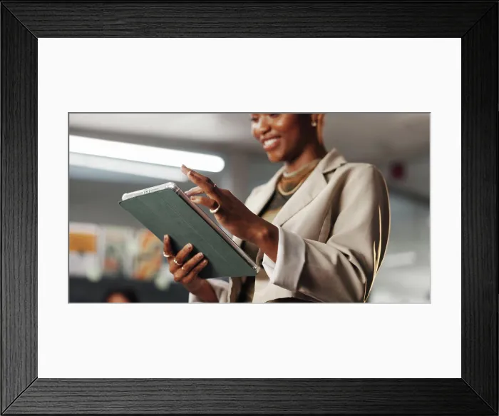 Framed Print : Hands, creative or woman scroll on tablet in office for logo design review Framed Print : Hands, creative or woman scroll on tablet in office for logo design review