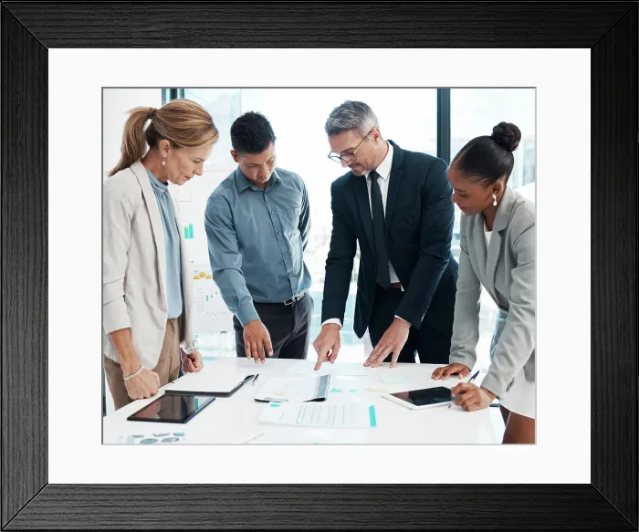 Framed Print : Finance, data and business people working on a graph in a modern office Framed Print : Finance, data and business people working on a graph in a modern office