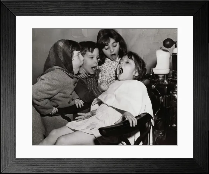 Framed Print : Girls playing dentist Framed Print : Girls playing dentist