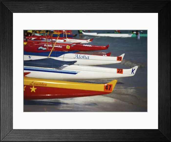 Framed Print : Hawaii, Oahu, Kailua, Lineup of colorful outrigger canoes on the shoreline at a canoe race