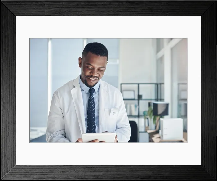 Framed Print : Reading, doctor and black man with tablet Framed Print : Reading, doctor and black man with tablet
