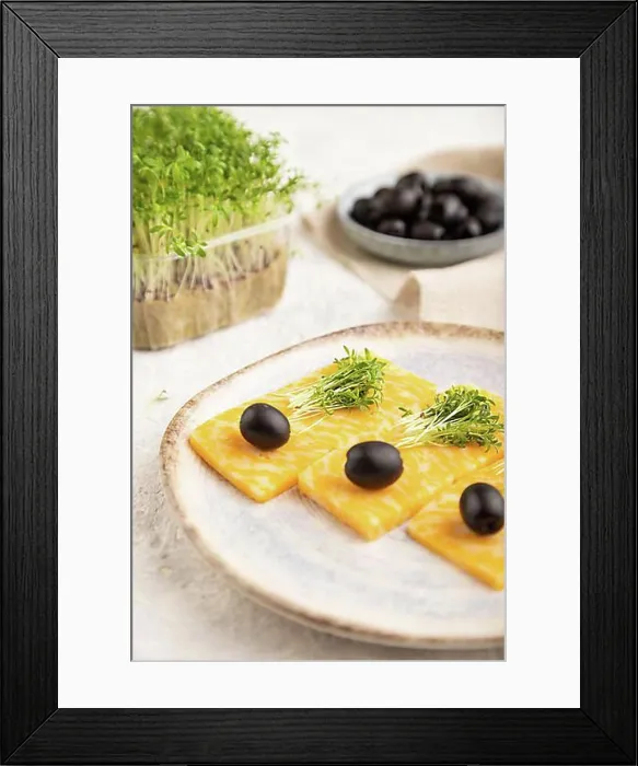 Framed Print : Marble cheese with olives and watercress microgreen on gray concrete background and linen textile Framed Print : Marble cheese with olives and watercress microgreen on gray concrete background and linen textile