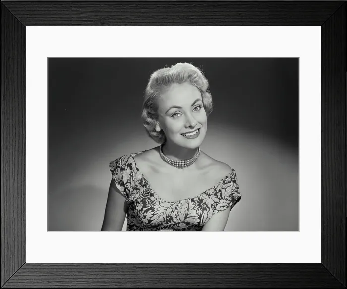 Framed Print : Vintage Photograph. Woman in lowcut dress smiling at camera