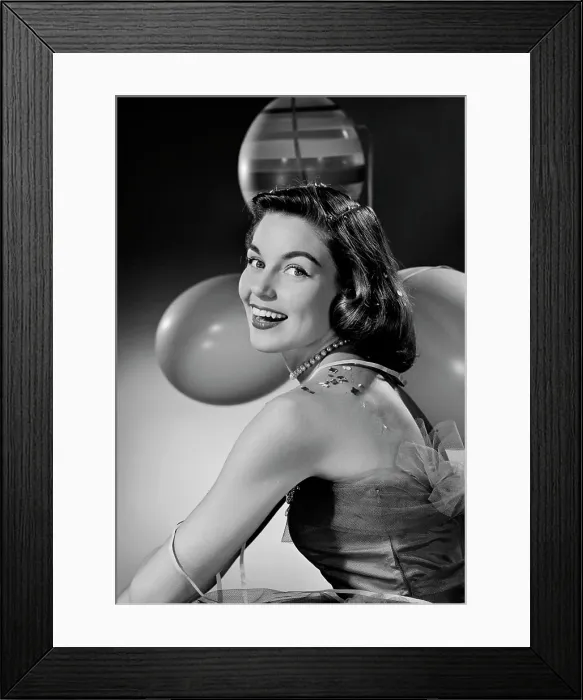 Framed Print : Portrait of young woman with balloons Framed Print : Portrait of young woman with balloons