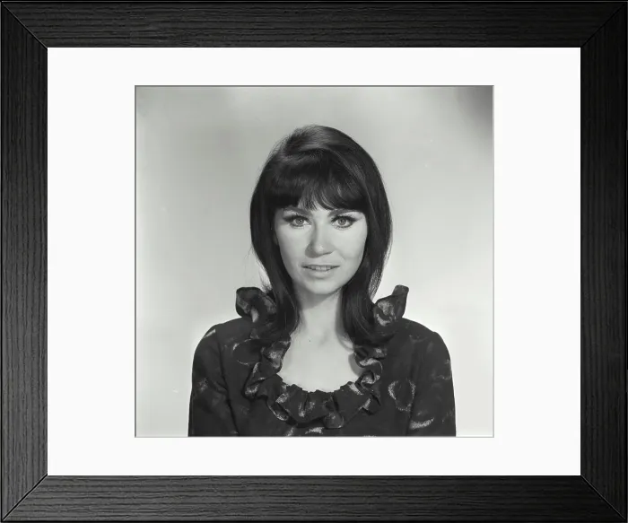Framed Print : Vintage Photograph. Head and shoulder portrait of a woman with black hair and bangs