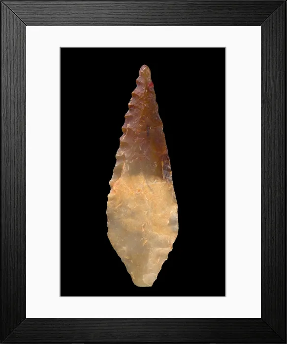 Framed Print : Arrowhead in chipped stone. Neolithic period Framed Print : Arrowhead in chipped stone. Neolithic period
