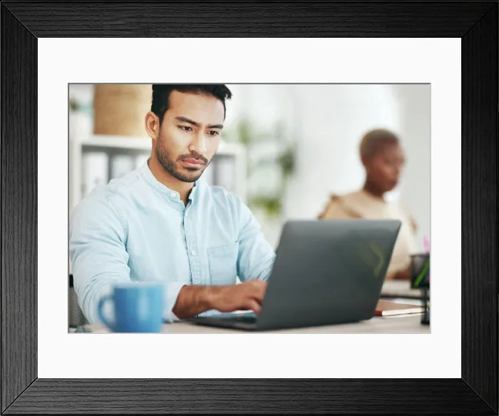 Framed Print : Asian man, laptop and typing in startup office for planning Framed Print : Asian man, laptop and typing in startup office for planning