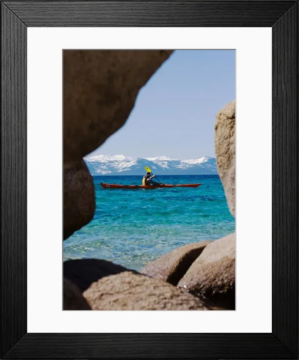 Framed Print : A man sea kayaking on Lake Tahoe near Incline Village in Nevada Framed Print : A man sea kayaking on Lake Tahoe near Incline Village in Nevada
