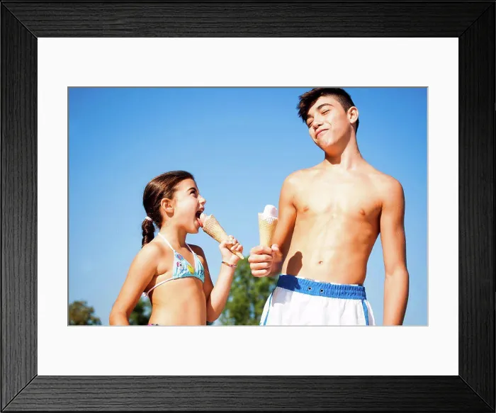 Framed Print : Boy and Girl eating Ice Cream Cones, Lampertheim, Hesse, Germany. 09 / 06 / 2013 Framed Print : Boy and Girl eating Ice Cream Cones, Lampertheim, Hesse, Germany. 09 / 06 / 2013