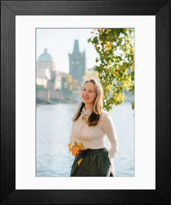 Framed Print : A young woman walks through the morning autumn sunny Prague Framed Print : A young woman walks through the morning autumn sunny Prague