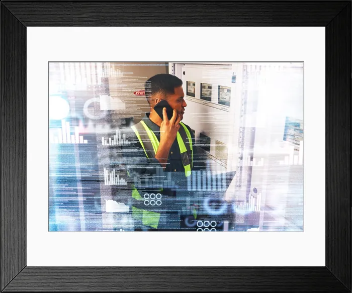 Framed Print : Electrician, engineering and phone call with technology hologram in a control room for maintenance Framed Print : Electrician, engineering and phone call with technology hologram in a control room for maintenance