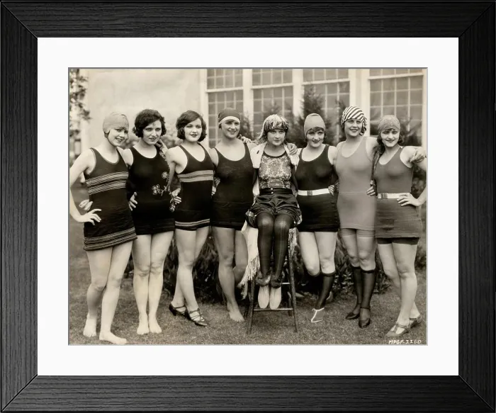 Framed Print : Portrait of group of young women in swimwear
