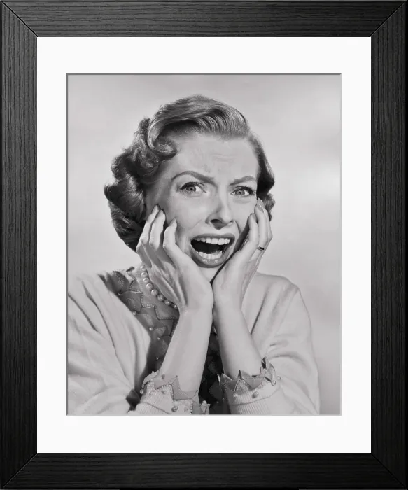 Framed Print : Portrait of a mid adult woman screaming Framed Print : Portrait of a mid adult woman screaming