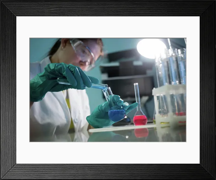 Framed Print : Young laboratorian carries chemical experiments Young laboratorian carries chemical experiments in laboratory Copyright Framed Print : Young laboratorian carries chemical experiments Young laboratorian carries chemical experiments in laboratory Copyright