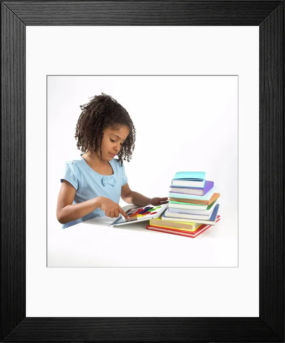 Framed Print : Girl using tablet computer Framed Print : Girl using tablet computer
