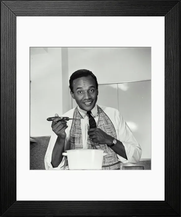 Framed Print : Vintage Photograph. African American man in apron making dinner