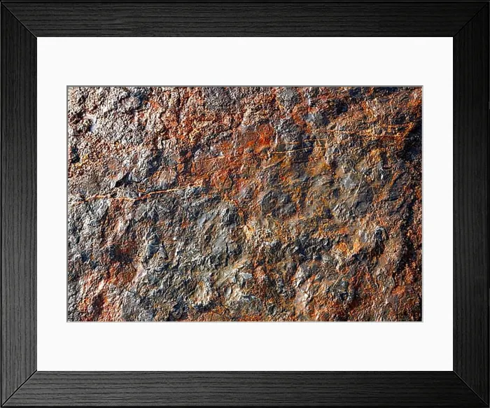 Framed Print : Stone texture in the beach shore with red oxide