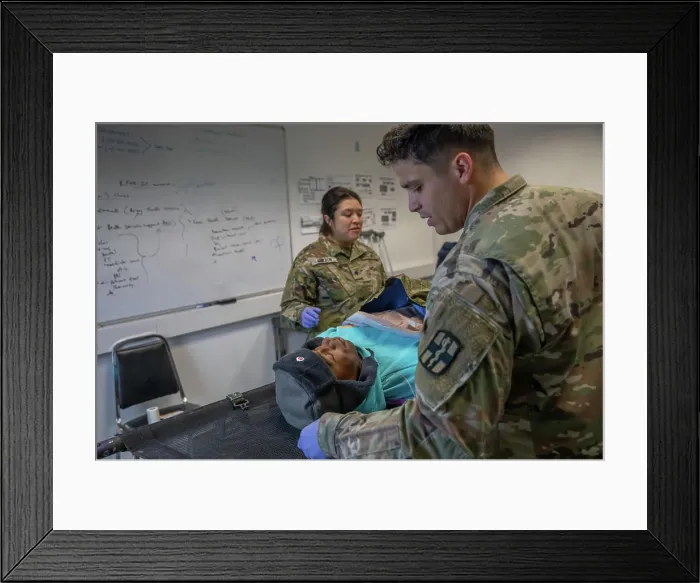 Framed Print : Soldiers of the 546th Medical Company Area Support participate in a Mission Rehearsal Exercise where they provide Framed Print : Soldiers of the 546th Medical Company Area Support participate in a Mission Rehearsal Exercise where they provide