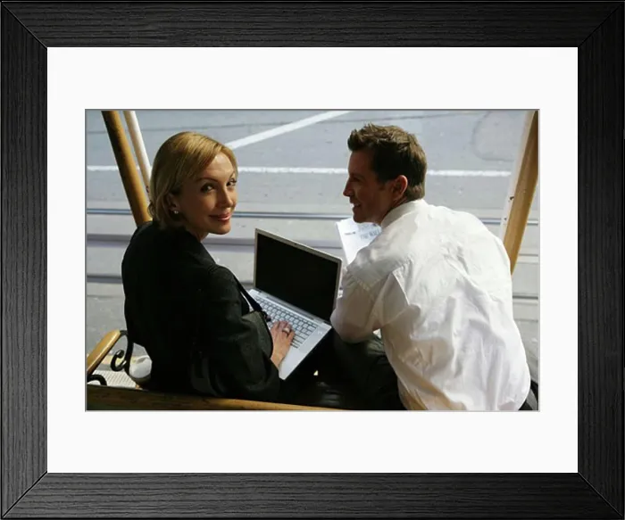 Framed Print : Couple sittng on a trolley Framed Print : Couple sittng on a trolley