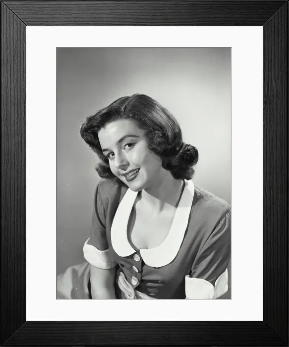 Framed Print : Vintage photograph. Woman in collared and button blouse smiling at camera