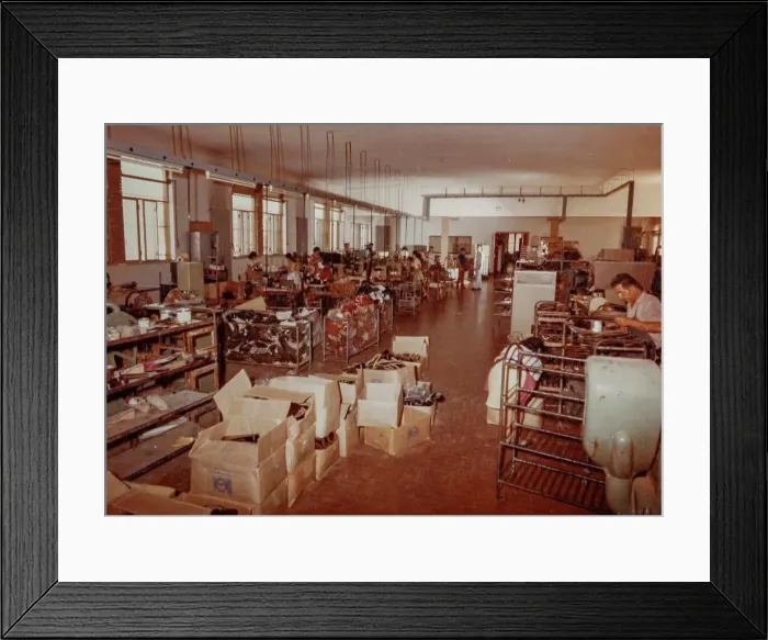 Framed Print : Rome, Italy may 1964: Shoemakers working diligently in a bustling shoe factory Framed Print : Rome, Italy may 1964: Shoemakers working diligently in a bustling shoe factory