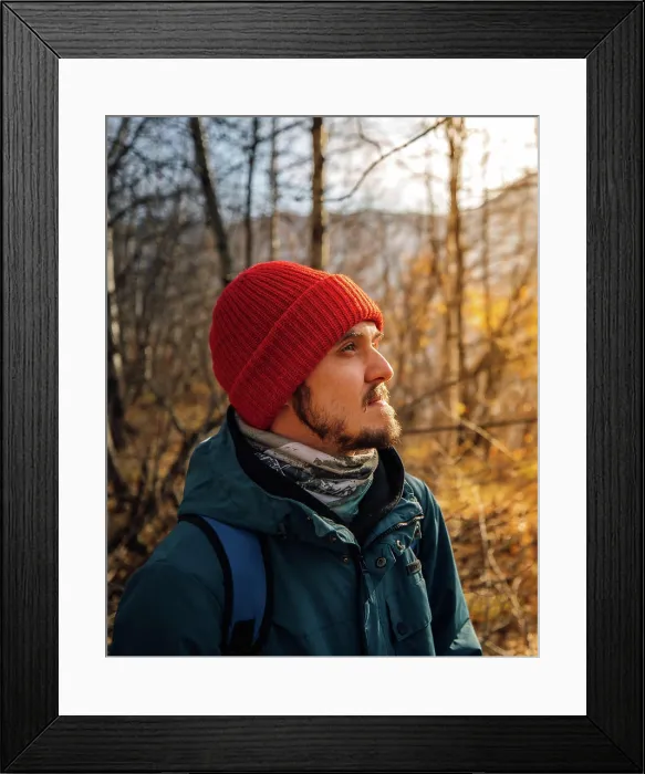 Framed Print : Autumn portrait of man in red hat with beard in forest
